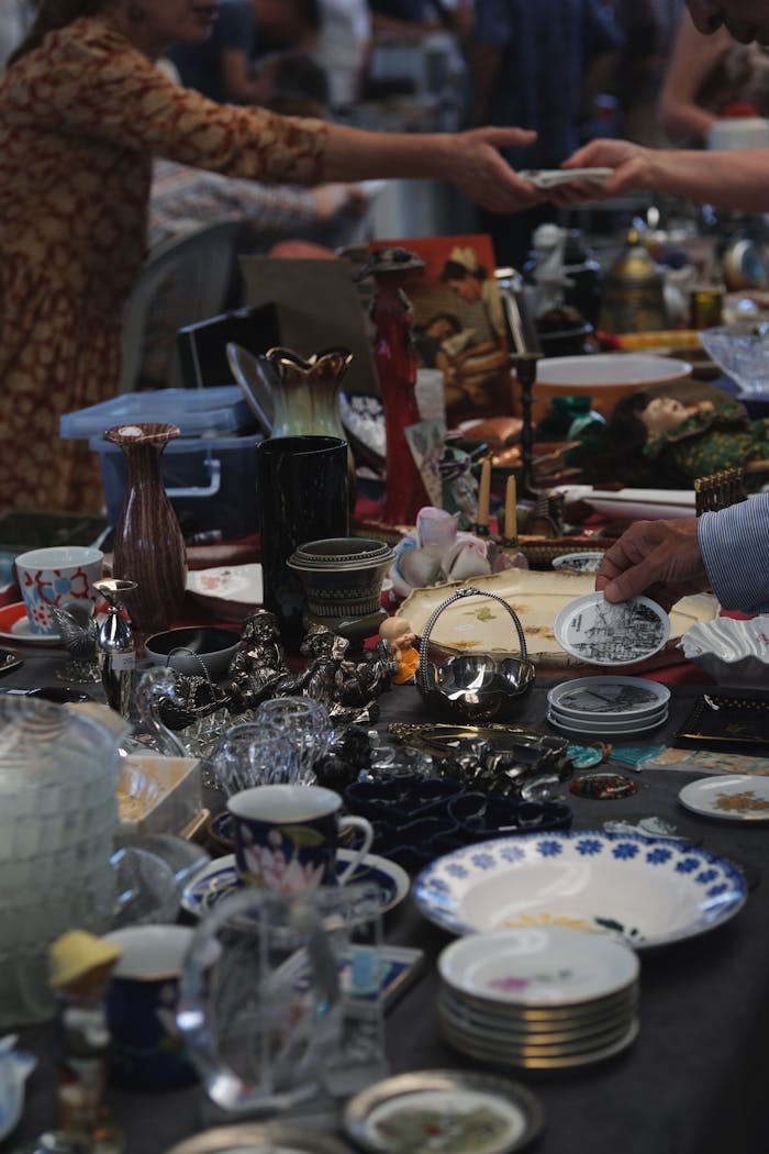 services-01 Discover unique items and antiques at a lively flea market tabletop display.